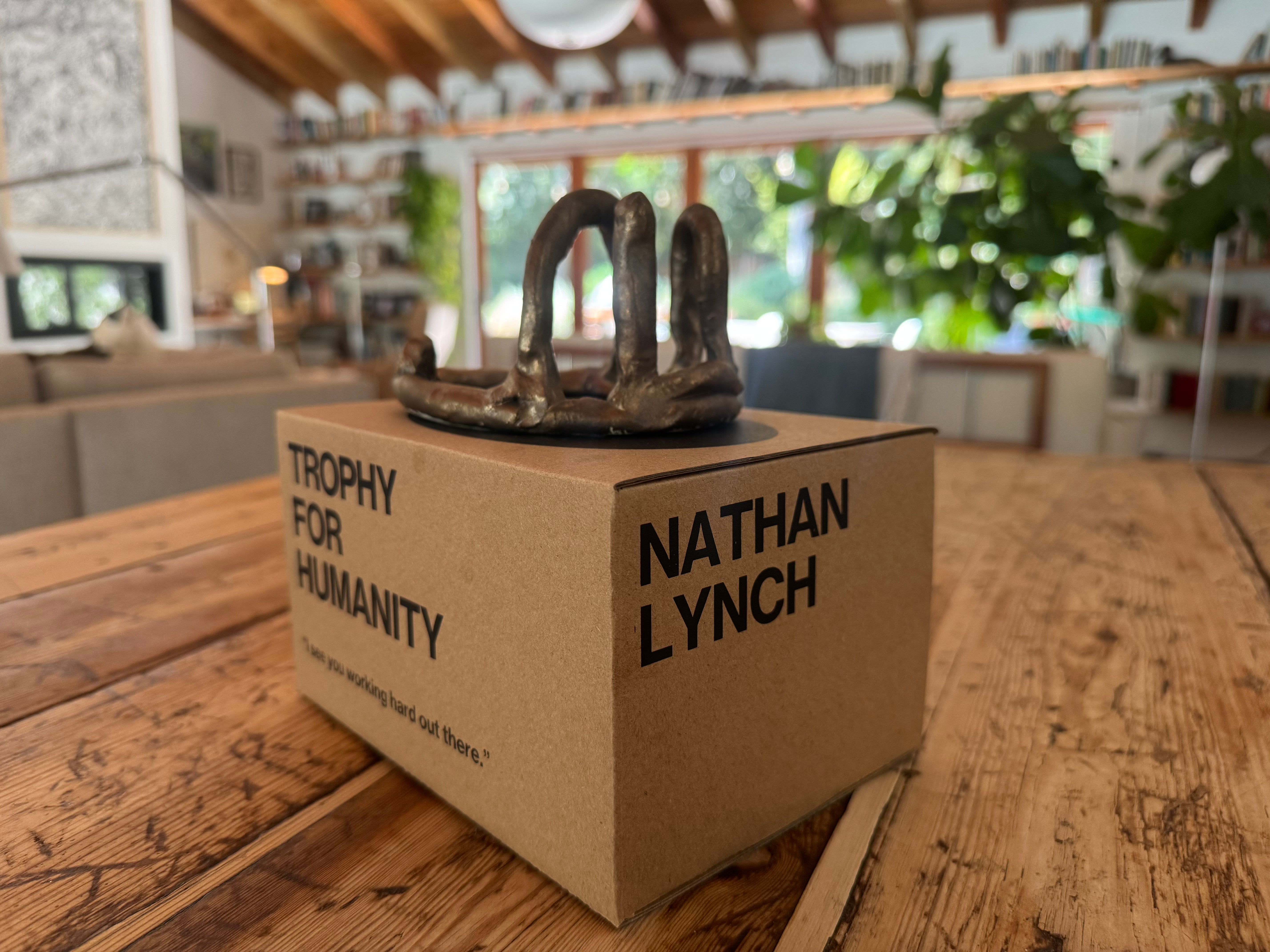 PROJECT NO. 6 NATHAN LYNCH: TROPHY FOR HUMANITY